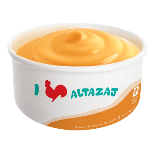 علبة كبيرة من صوص الجبنة الكريمية المذابة.